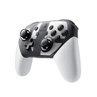 NİNTENDO SWİTCH OLED NEON RED/NEON BLUE OYUN KONSOLU + SUPER SMASH BROS NİNTENDO ULTİMATE SWİTCH OYUN + SUPER SMASH BROS. SPECİAL EDİTİON PRO CONTROLLER